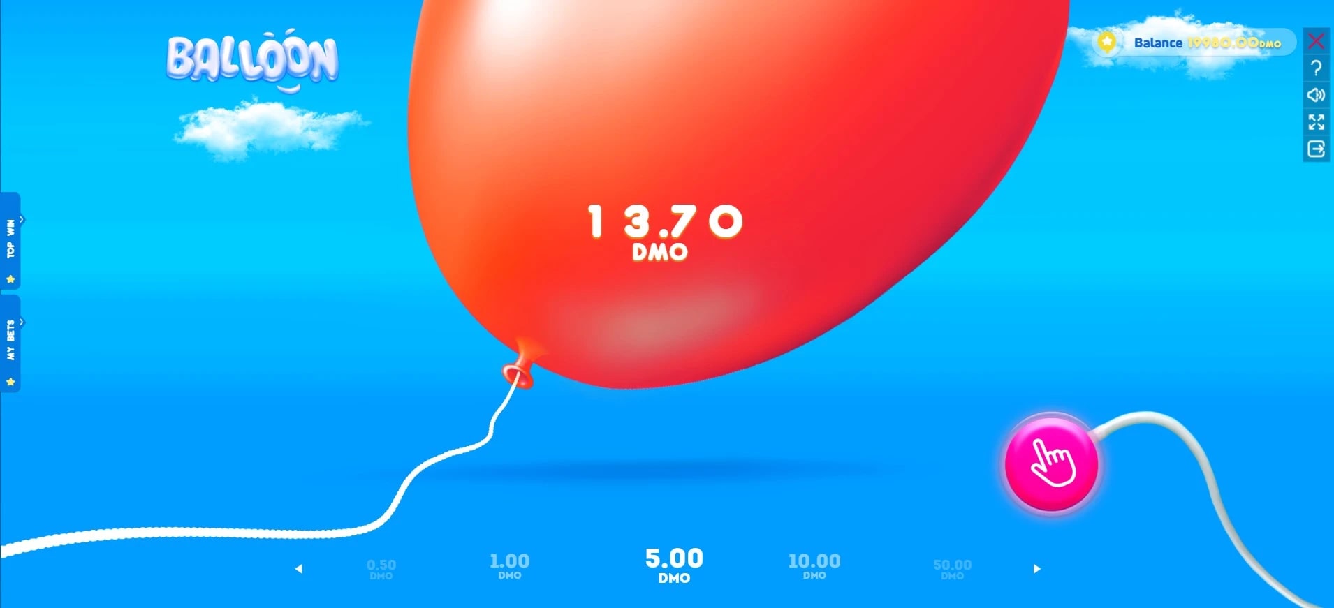 A balloon game interface showing a large red balloon against a blue sky background with clouds. The game displays '13.70 DMO' on the balloon and has betting amounts of 0.50, 1.00, 5.00, 10.00, and 50.00 DMO shown at the bottom. A pink circular button with a hand cursor icon is visible on the right.